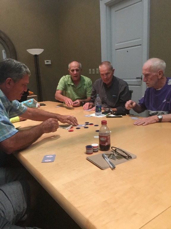 Mike Thomas dealing a poker hand to James Eddy, Steve Tanner BLHS Class of 66, and Tony Anderson. Sept 2017